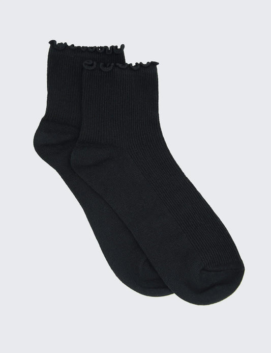 A black crew sock with ribbed texture and a lettuce edge design.