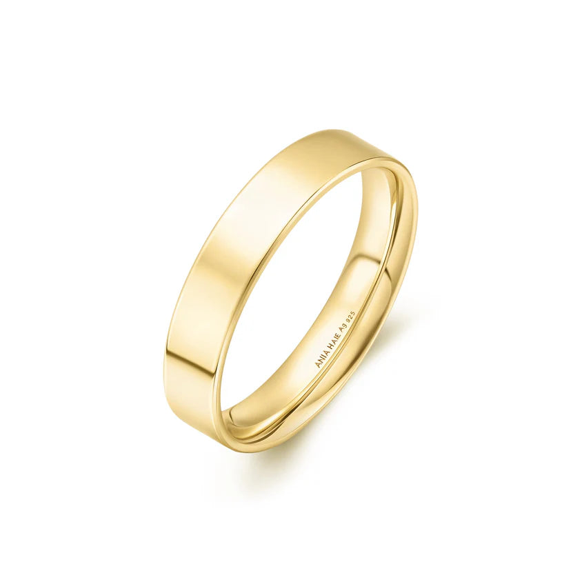 Gold ring on a white background